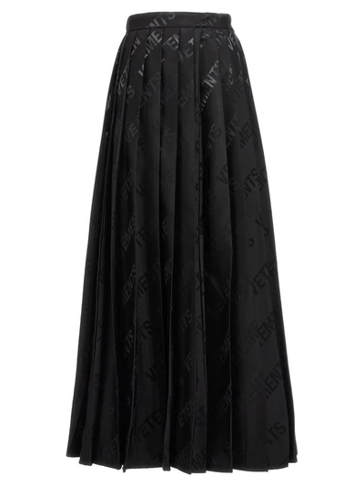 Shop Vetements 'monogram Pleated' Skirt In Black