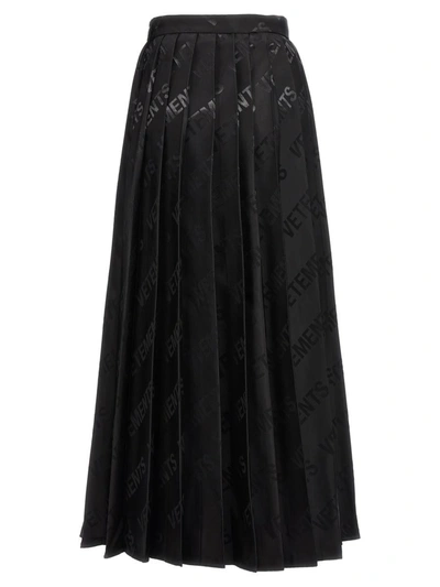 Shop Vetements 'monogram Pleated' Skirt In Black