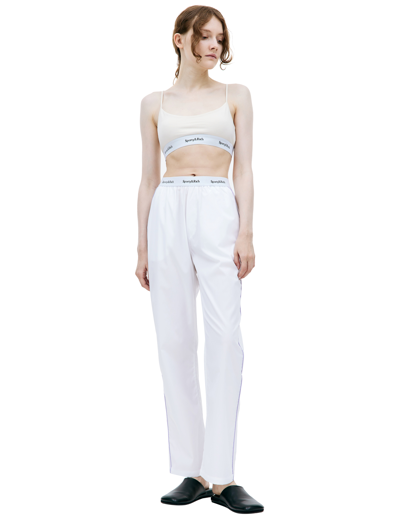 Shop Sporty And Rich White Serif Pyjama Trousers