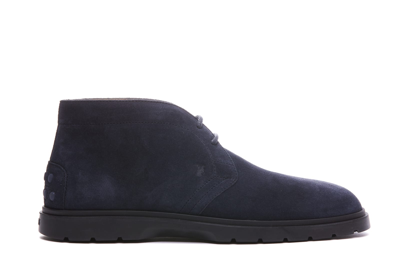 Shop Tod's Suede Lace Up Boots In Blue