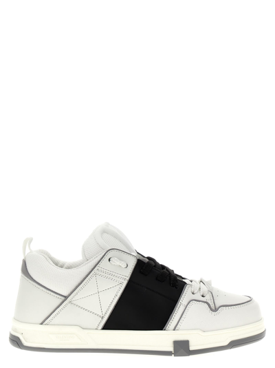Shop Valentino Garavani Open Skate Sneakers In White/black