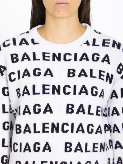 Shop Balenciaga Allover Logo Sweater In White