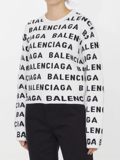 Shop Balenciaga Allover Logo Sweater In White