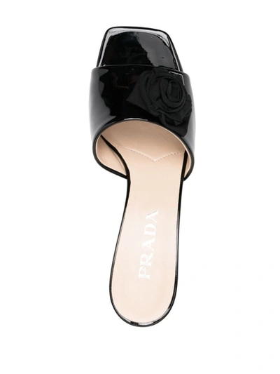Shop Prada 65mm Floral-appliqué Leather Mules In Black
