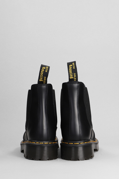 Shop Dr. Martens' 2976 Combat Boots In Black Leather