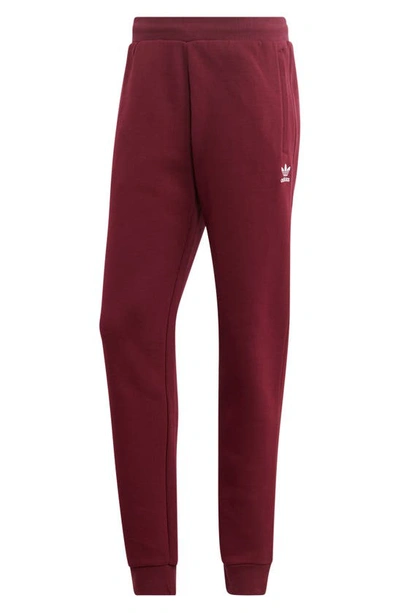 Shop Adidas Originals Trefoil Essentials Joggers In Maroon