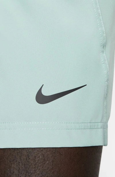 Shop Nike Dri-fit Form Athletic Shorts In Mineral/ Black