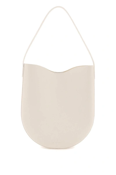 Shop Il Bisonte Shoulder Hobo Bag In White