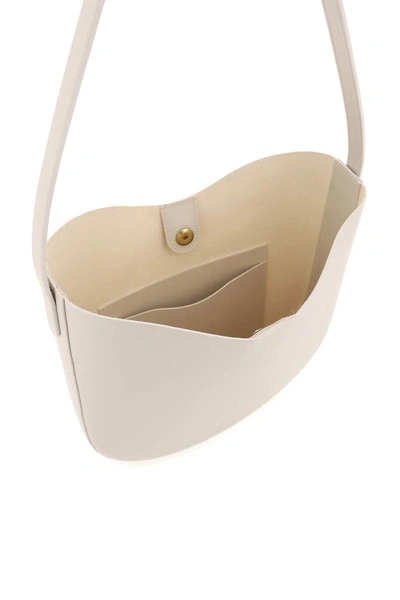 Shop Il Bisonte Shoulder Hobo Bag In White