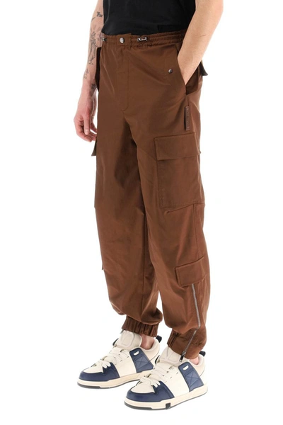 Shop Valentino Cargo Pants With Zippered Ankle In Brown