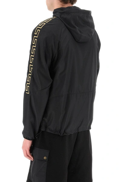 Shop Versace 'greek' Nylon Sport Jacket In Black