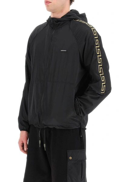 Shop Versace 'greek' Nylon Sport Jacket In Black