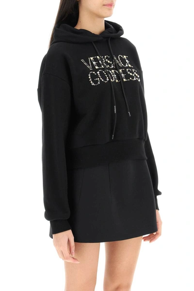 Shop Versace Studded Logo Hoodie In Black