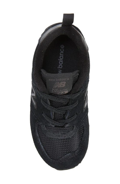 Shop New Balance Kids' 574 Sneaker In Black/ White2