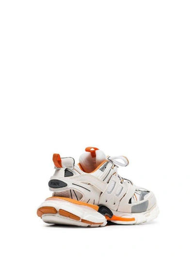 Shop Balenciaga Sneakers In Wht/orange