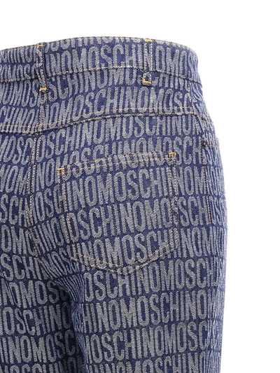 Shop Moschino 'logo' Jeans In Blue
