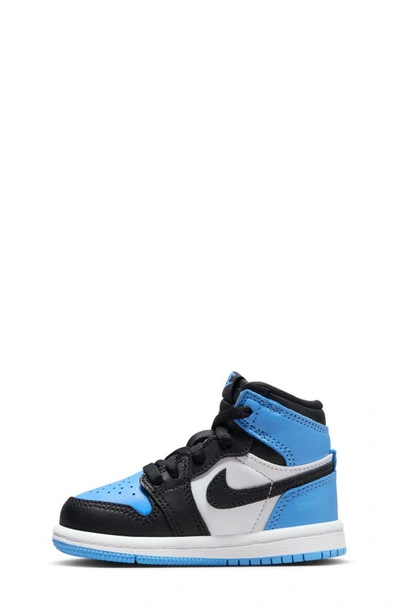 Shop Jordan Kids' Air  1 Retro High Top Sneaker In University Blue/ Black/ White