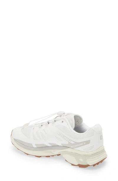 Shop Salomon Gender Inclusive Xt-wings 2 Sneaker In White/lunar Rock/vanilla