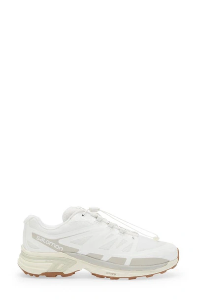 Shop Salomon Gender Inclusive Xt-wings 2 Sneaker In White/lunar Rock/vanilla
