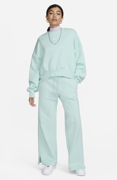 Shop Nike Sportswear Phoenix High Waist Wide Leg Sweatpants In Jade Ice/ Sail