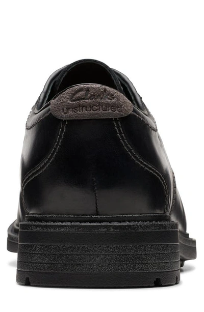 Shop Clarks Derby Sneaker In Black Leather