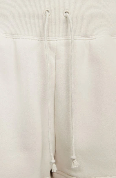 Shop Nike Phoenix Fleece Knit Shorts In Ltowbr/sail
