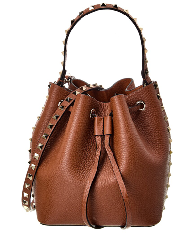 Shop Valentino Rockstud Grainy Leather Bucket Bag In Brown