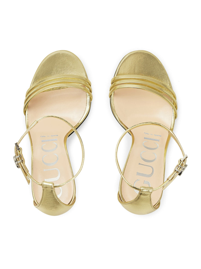 Shop Gucci Women Metallic Woman Sandal With Heel In Gold