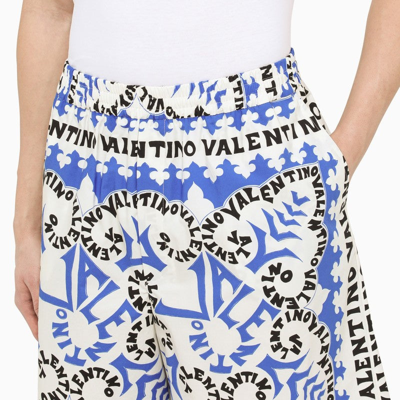 Shop Valentino Printed Cotton Bermuda Shorts Men In Blue