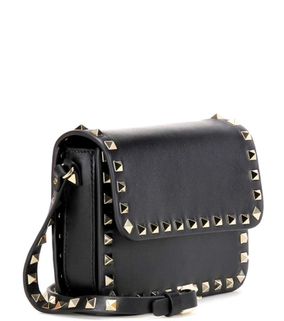 Shop Valentino Garavani Rockstud Leather Cross-body Bag In Eero
