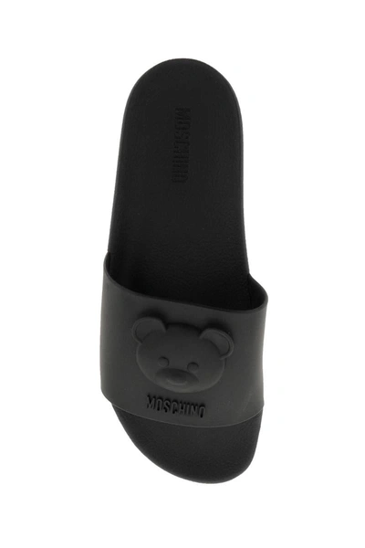 Shop Moschino Rubber Slides With Embossed Teddy Bear In Black