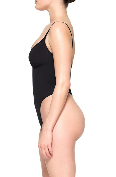 Shop Skims Seamless Sculpt Thong Bodysuit In Onyx