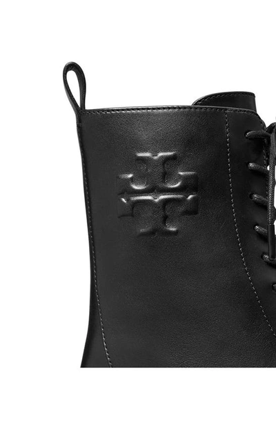 Shop Tory Burch Embossed Logo Lace-up Combat Boot In Perfect Black