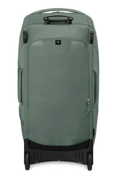 Shop Osprey Sojourn 36-inch Shuttle Wheeled Recycled Nylon Duffle Bag In Koseret Green