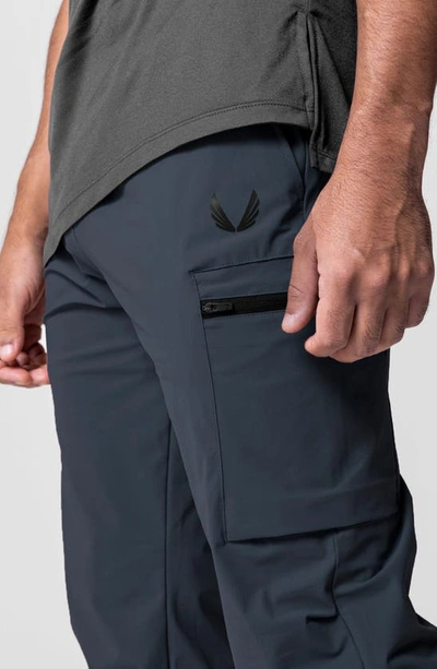Shop Asrv Tetra-lite™ Water Repellent Zip Track Pants In Navy