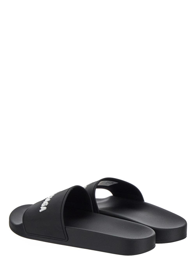 Shop Balenciaga Pool Slide Sandal In Black