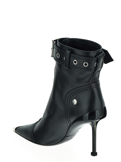 Shop Alexander Mcqueen Zipped Ankle Boot In Black