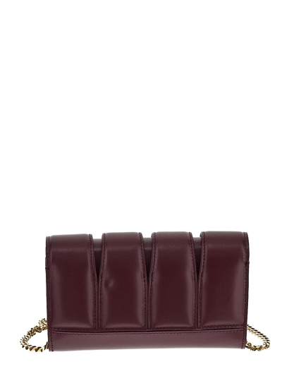 Shop Alexander Mcqueen The Slash Clutch Bag In Burgundy