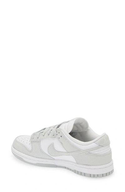 Shop Nike Dunk Low Sneaker In White/ Light Silver