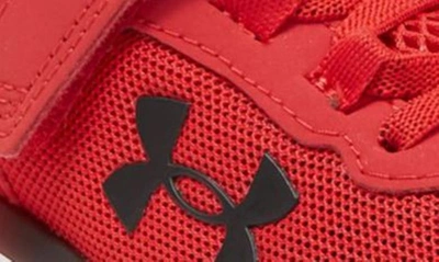 Shop Under Armour Bps Assert 9 Running Sneaker In Red / White / Black