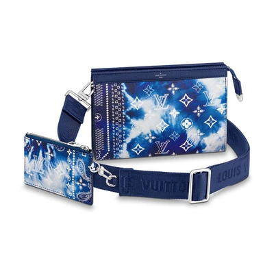 Shop Louis Vuitton Gaston Wearable Wallet In Bleu
