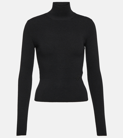 Shop Patou Ribbed-knit Turtleneck Wool-blend Sweater In Black