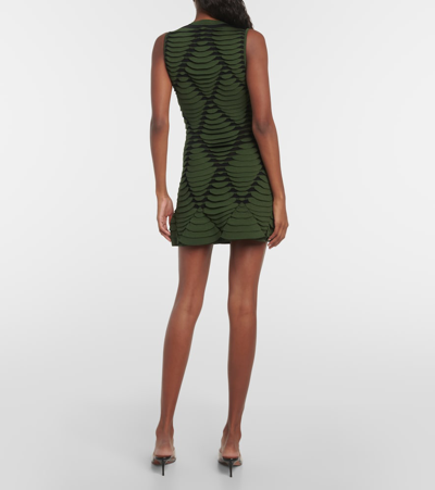 Shop Alaïa Snake-effect Knit Minidress In Green
