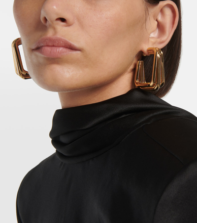 Shop Saint Laurent Hoop Earrings In Gold