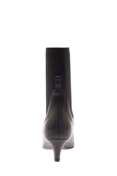 Shop Totême The Mid Heel Leather Boot In Black