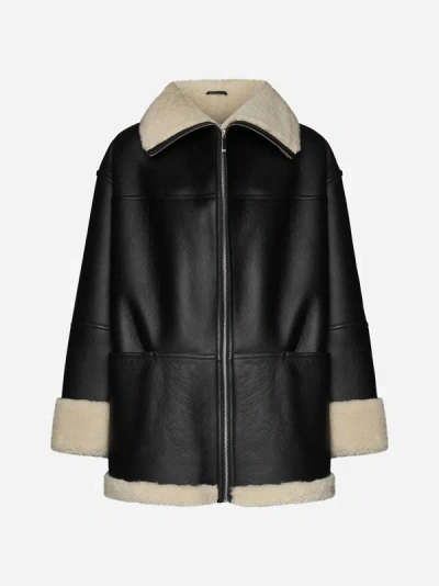 Shop Totême Leather And Shearling Jacket In Black,off White
