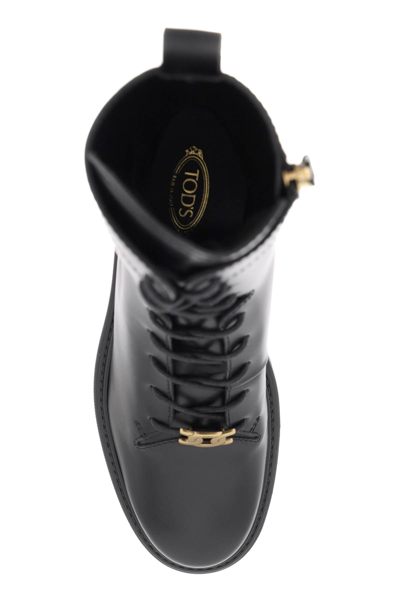 Shop Tod's Leather Combat Boots In Nero (black)
