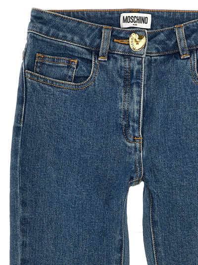 Shop Moschino Button Detail Jeans In Blue