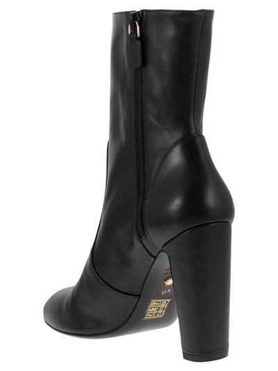 Shop Stuart Weitzman Vida 100 - Zip Boot In Black