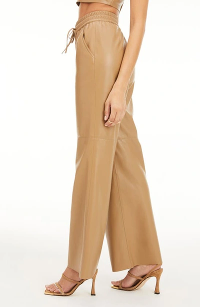 Good American Faux Leather Wide Leg Pants In Warm Carmel003
